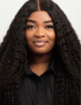 Headshot of Ivana Okaro (She, her)